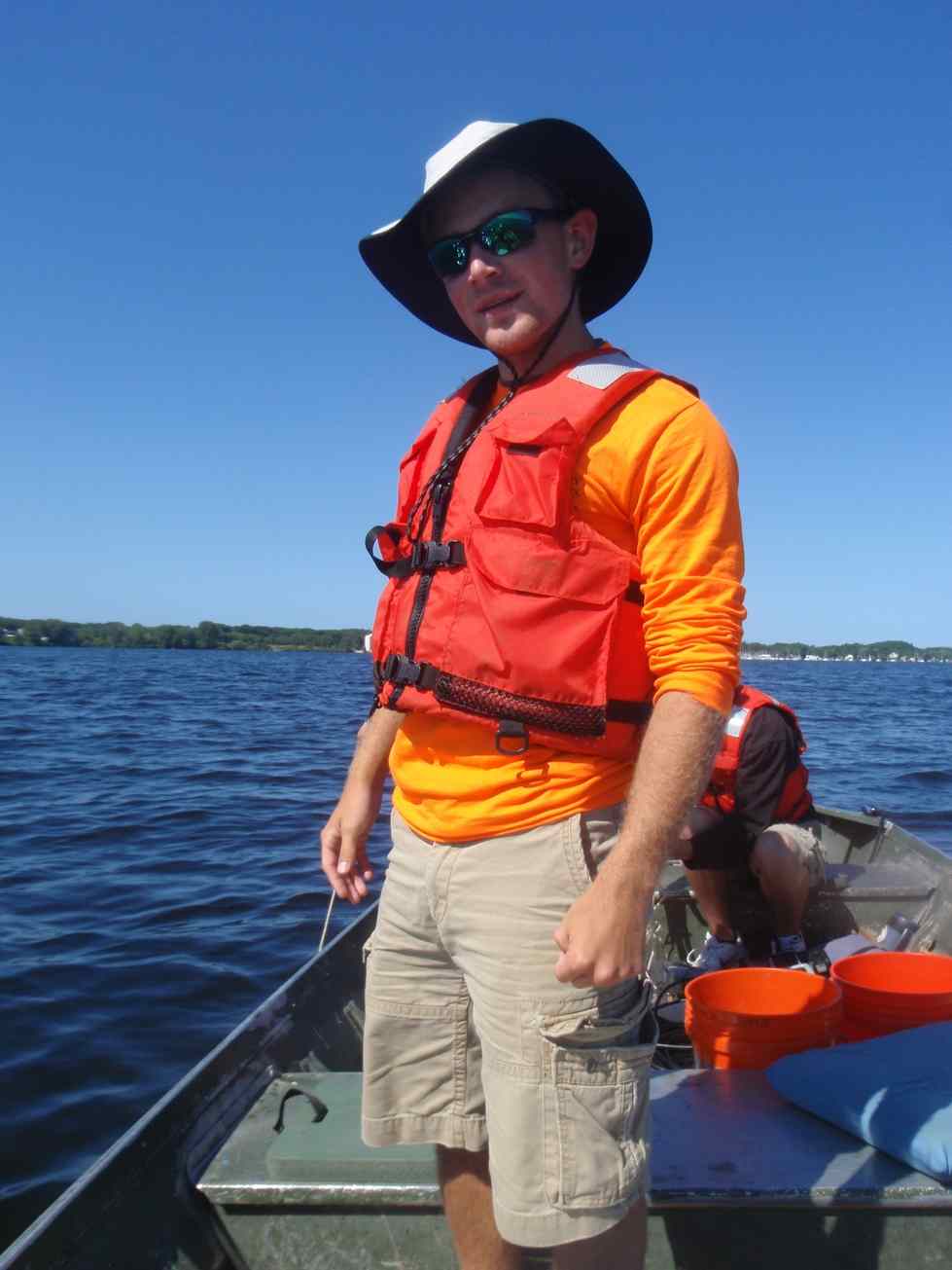 Nick Weber on a jon boat on Muskegon Lake